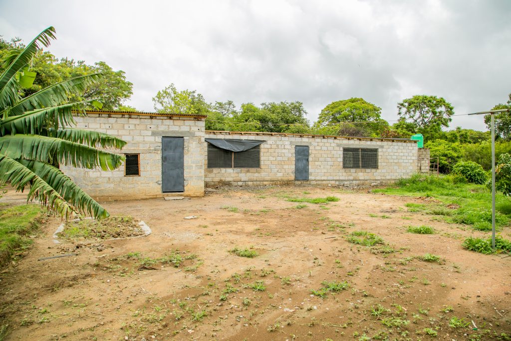 Outside view of the chicken coop in Zambia.